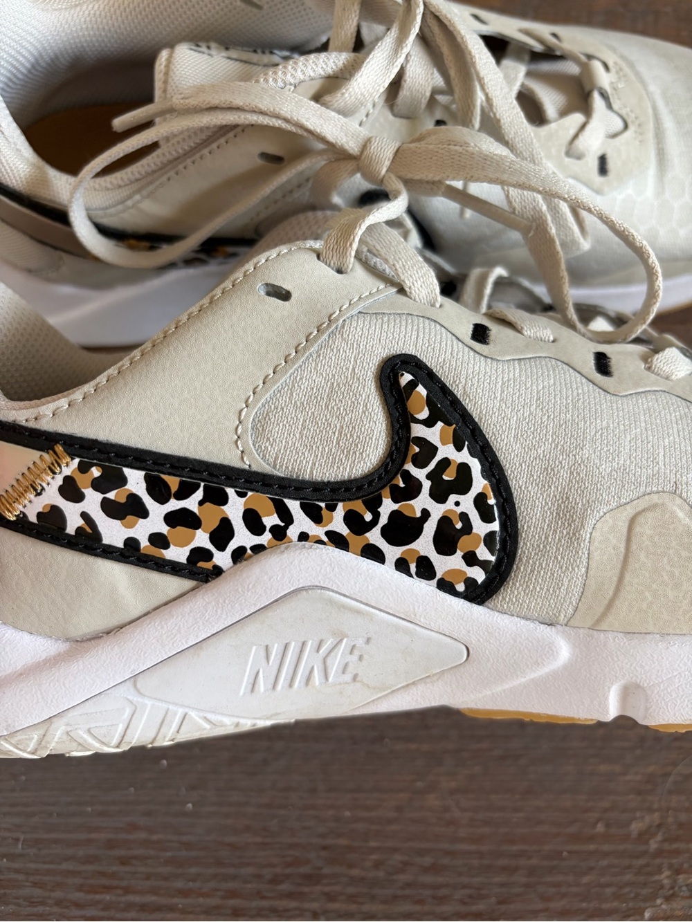 Nike Cream Sneakers with Leopard-Print Swoosh and Black Trim
